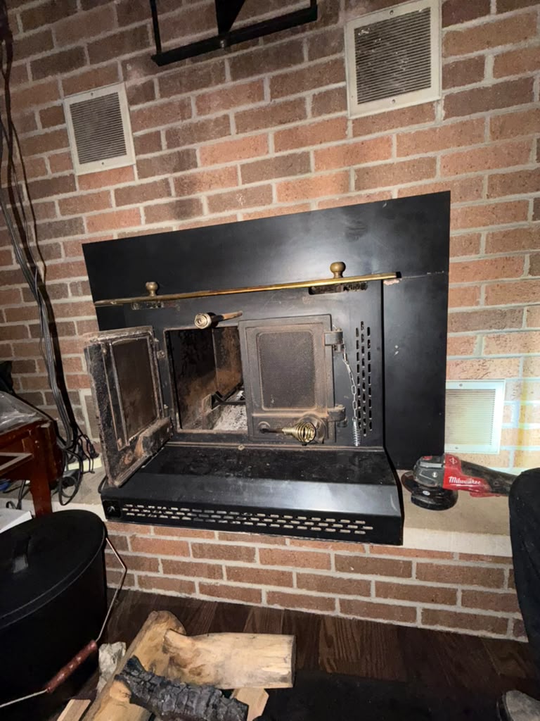 Wood-burning fireplace insert cleaned and serviced