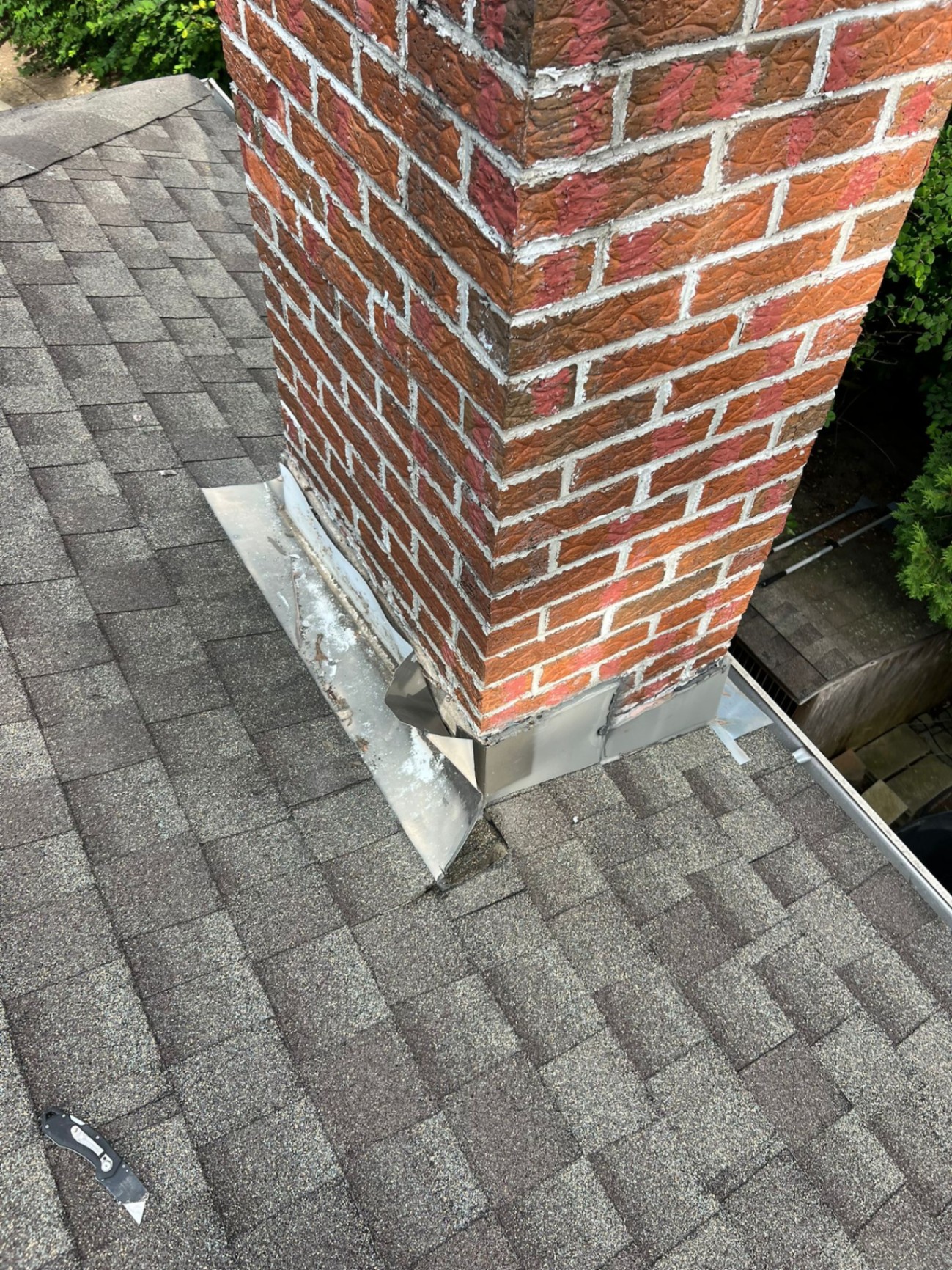 Spalling painted stucco → fresh elastomeric coat — after