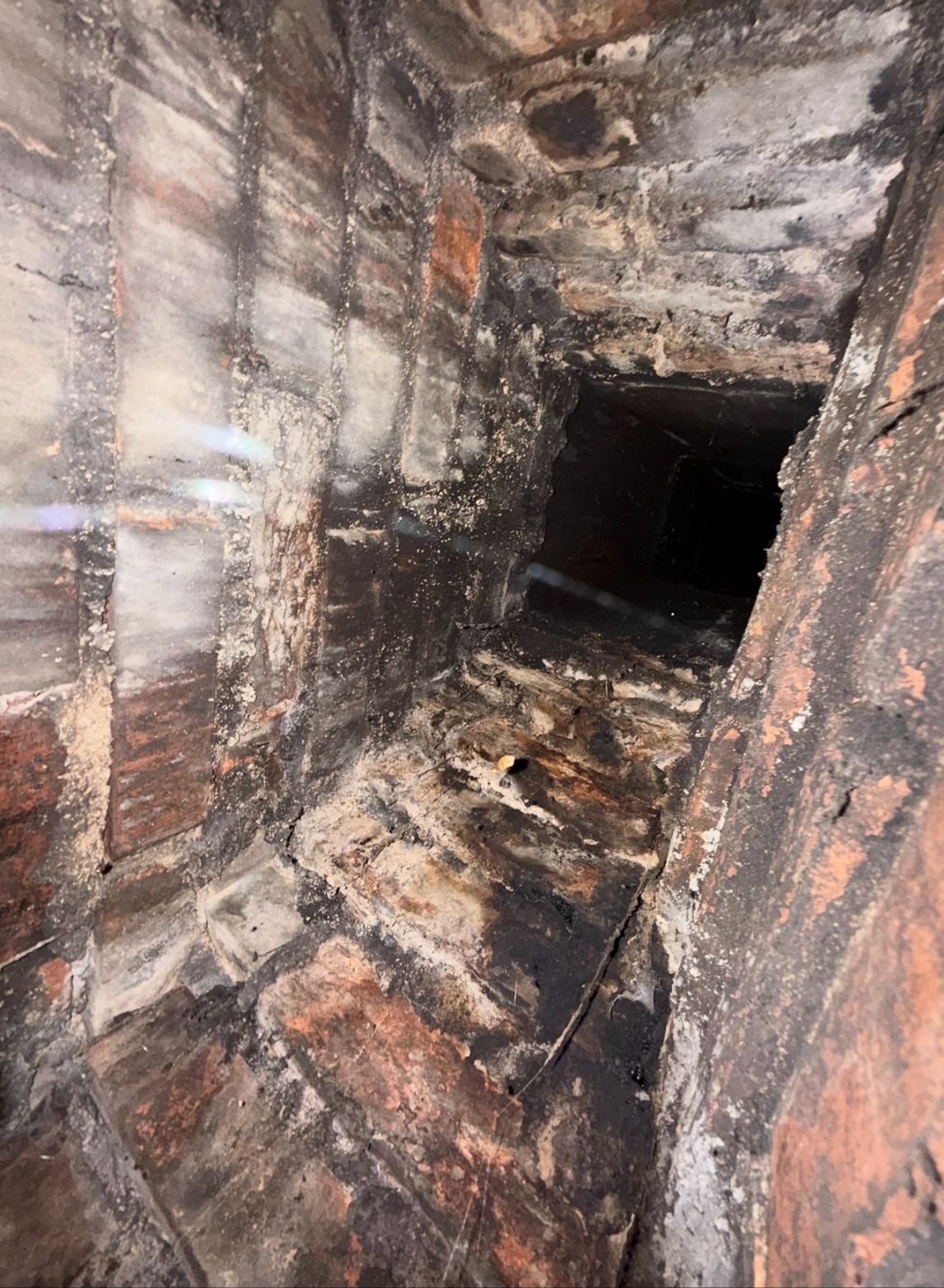Smoke chamber parge coat — before and after — before