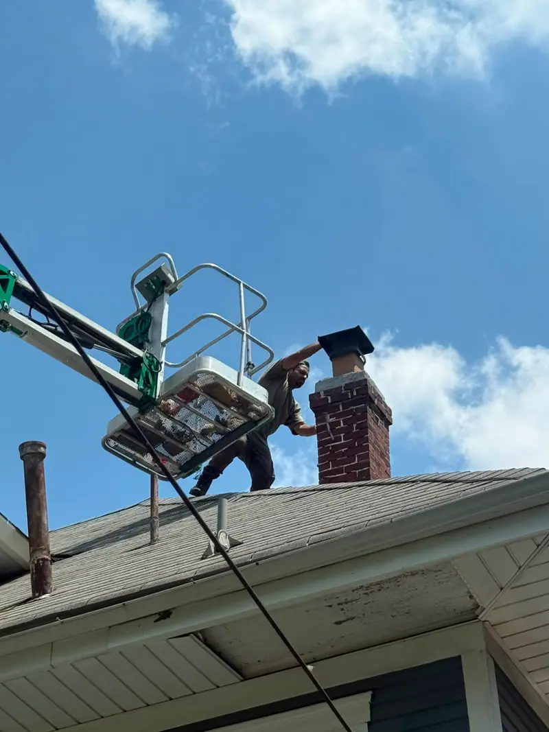 Boom Lift Cap Install — Chimcrew - Chimney Sweep & Repair project in Upper Arlington, OH
